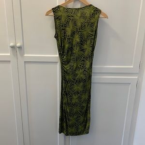 Form fitting asymmetrical dress Diane von Furstenberg palm pattern